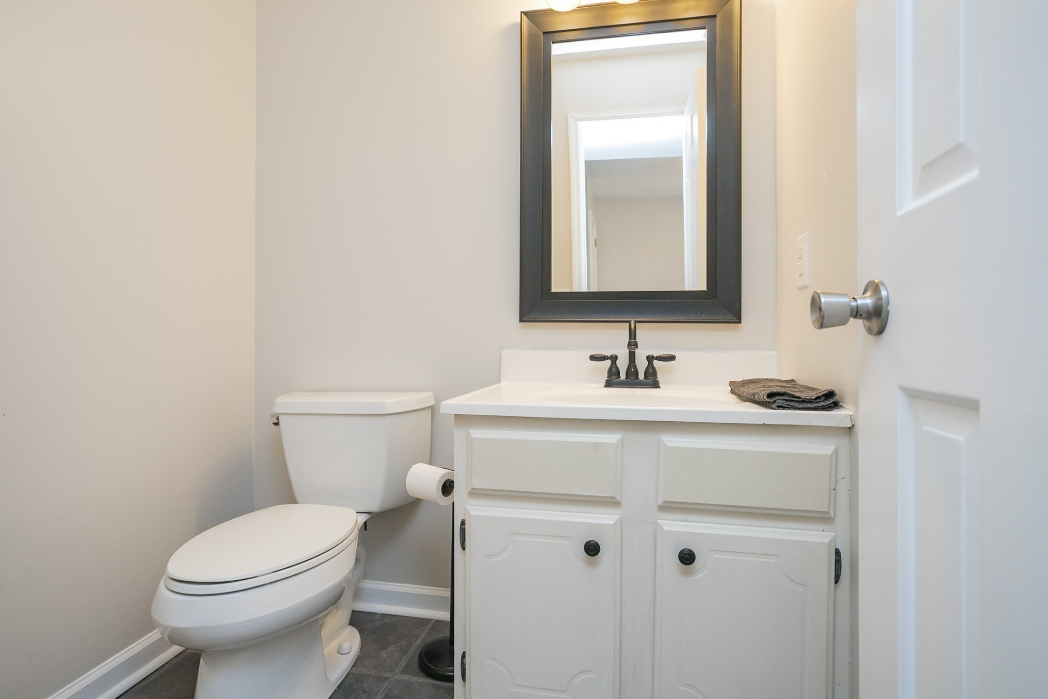 601 Boyd Mill Avenue, Unit C1 Franklin, TN 37064 - Photo 12 of 39 a bathroom with a sink toilet and mirror