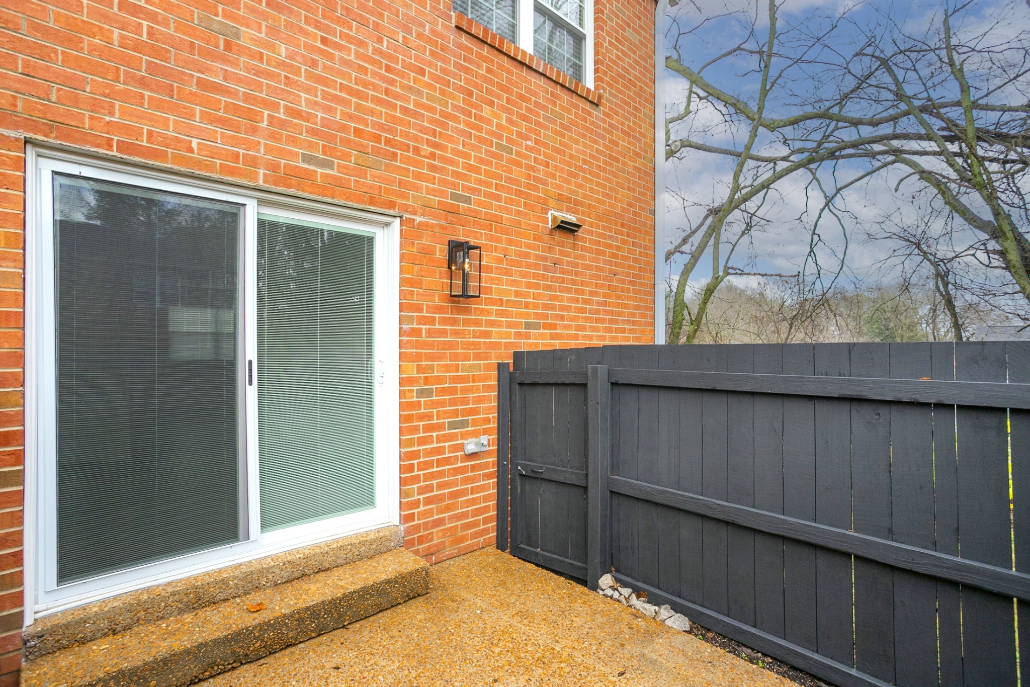 601 Boyd Mill Avenue, Unit C1 Franklin, TN 37064 - Photo 30 of 39 a view of a house with a door and wooden bench