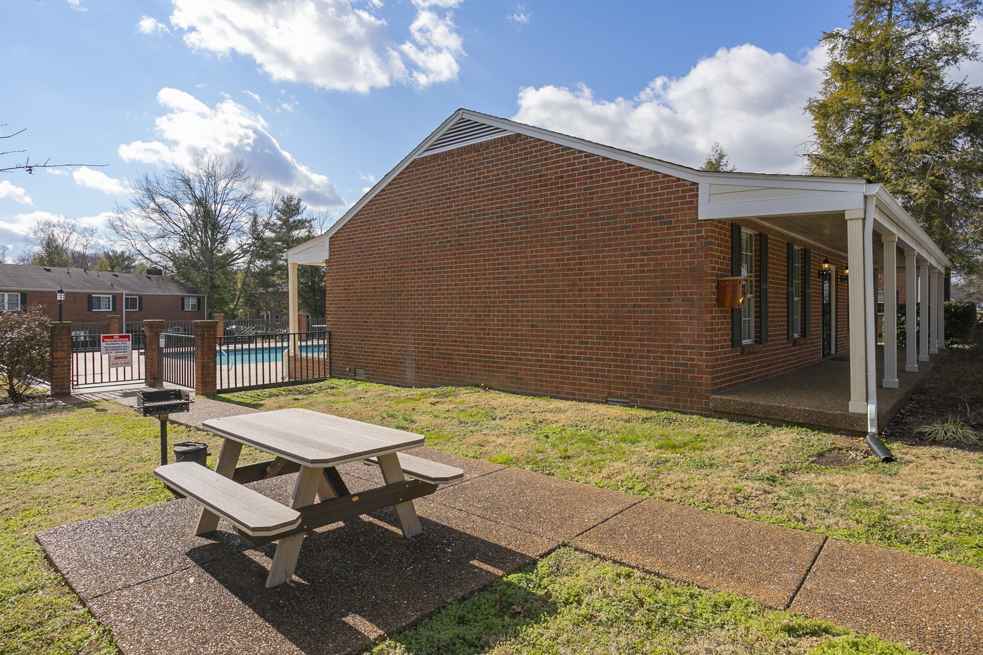 601 Boyd Mill Avenue, Unit C1 Franklin, TN 37064 - Photo 38 of 39 a backyard of a house with table and chairs
