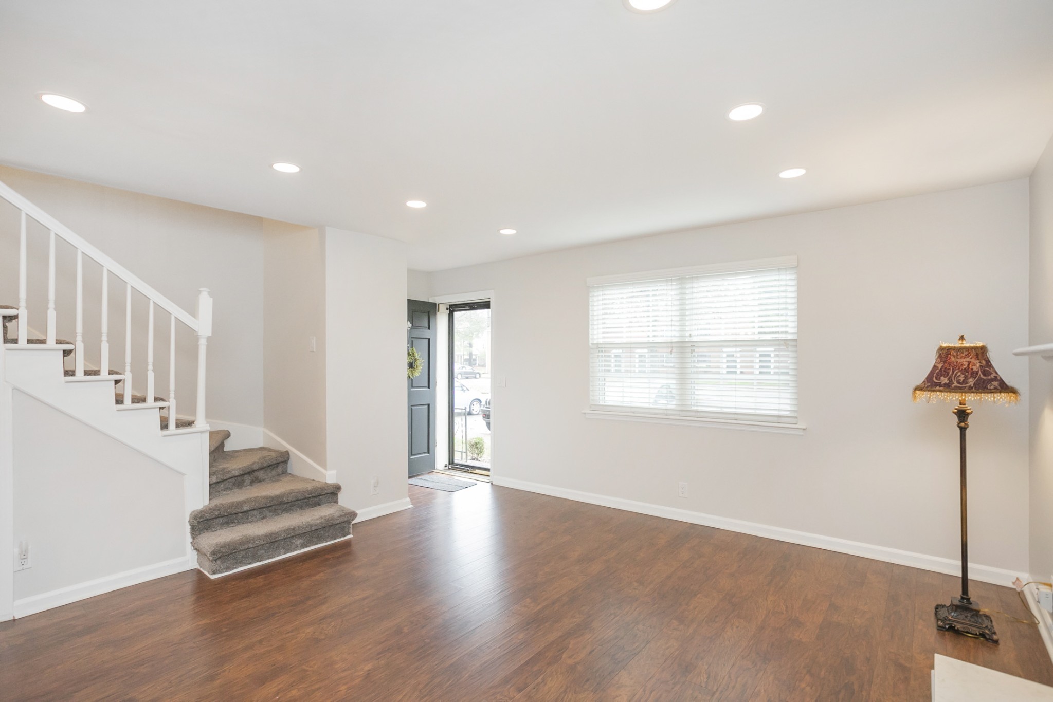 601 Boyd Mill Avenue, Unit C1 Franklin, TN 37064 - Photo 5 of 39 a view of an entryway with wooden floor and door