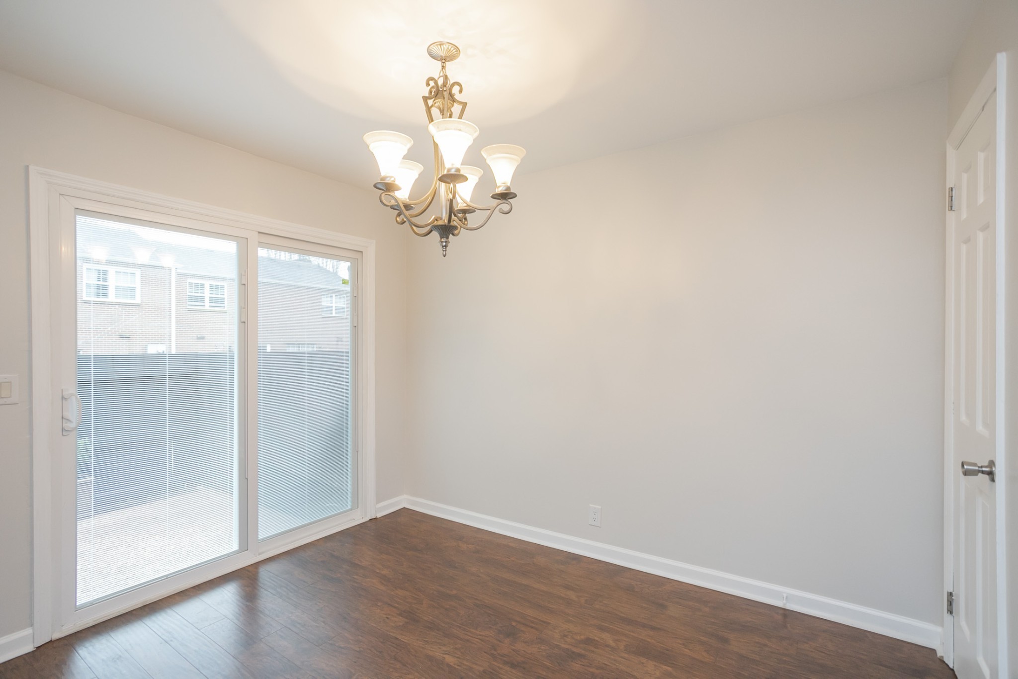 601 Boyd Mill Avenue, Unit C1 Franklin, TN 37064 - Photo 7 of 39 wooden floor in an empty room with a window