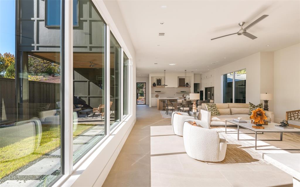 7410 Kenwell Street Dallas, TX 75209 - Photo 20 of 40 a living room with fireplace furniture and a large window