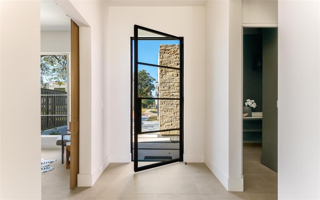 7410 Kenwell Street Dallas, TX 75209 - Photo 2 of 40 a view of an empty room and window