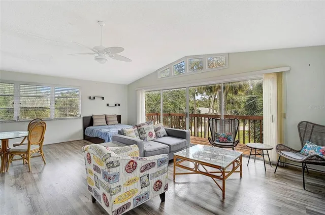 a view of balcony with furniture