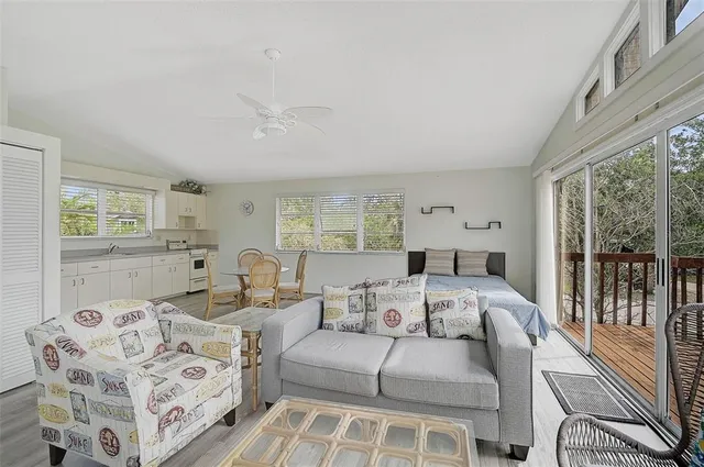 a view of balcony with wooden floor