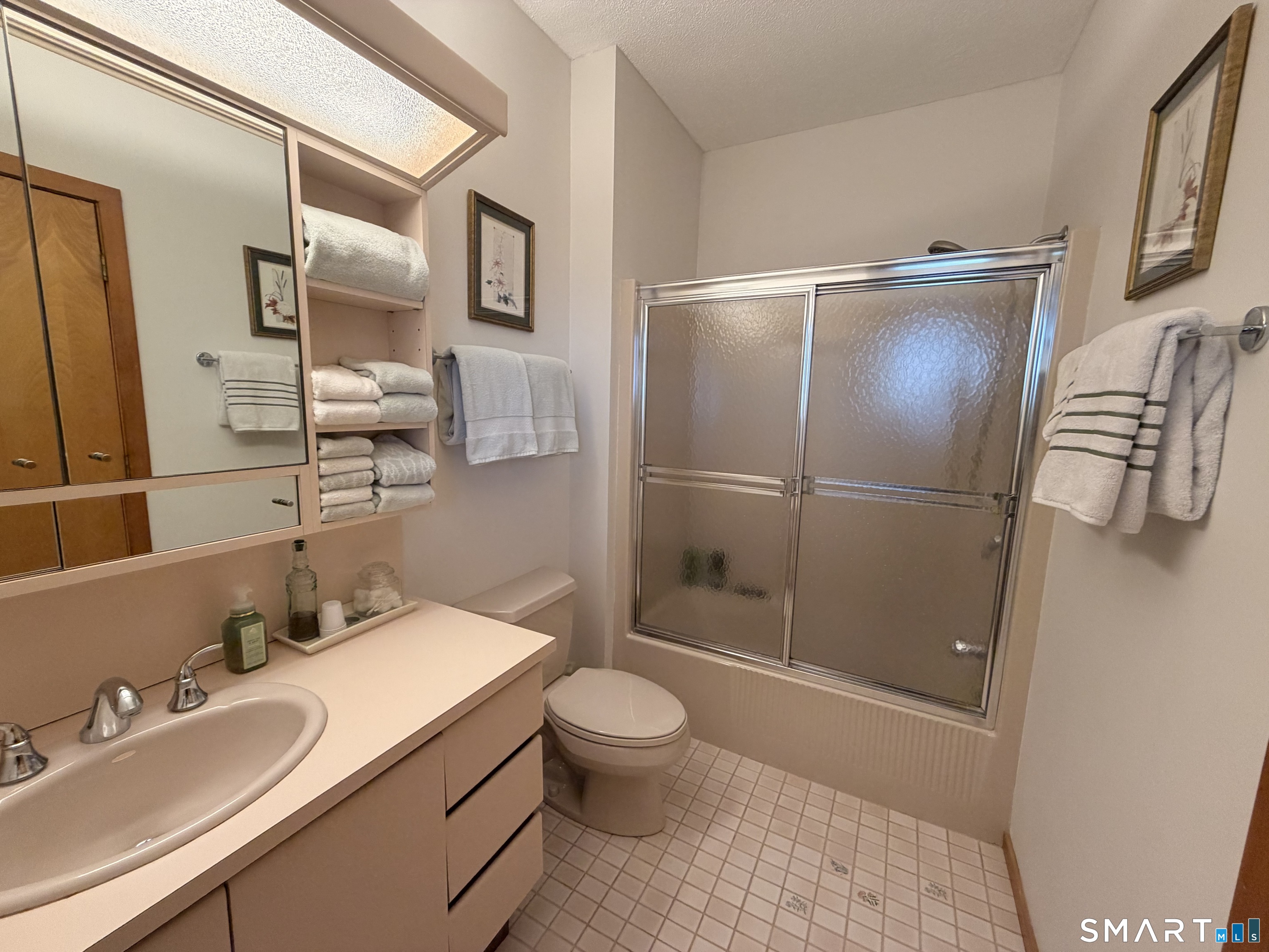 86 Washburn Road Canton, CT 06019 - Photo 11 of 40 a bathroom with a sink toilet and shower