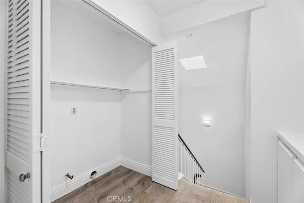 a view of a hallway with staircase