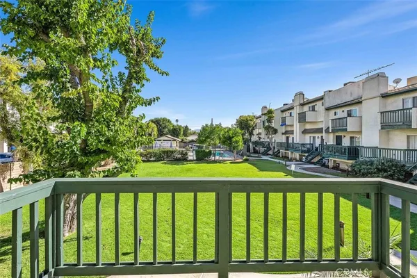 a view of a balcony with outdoor space