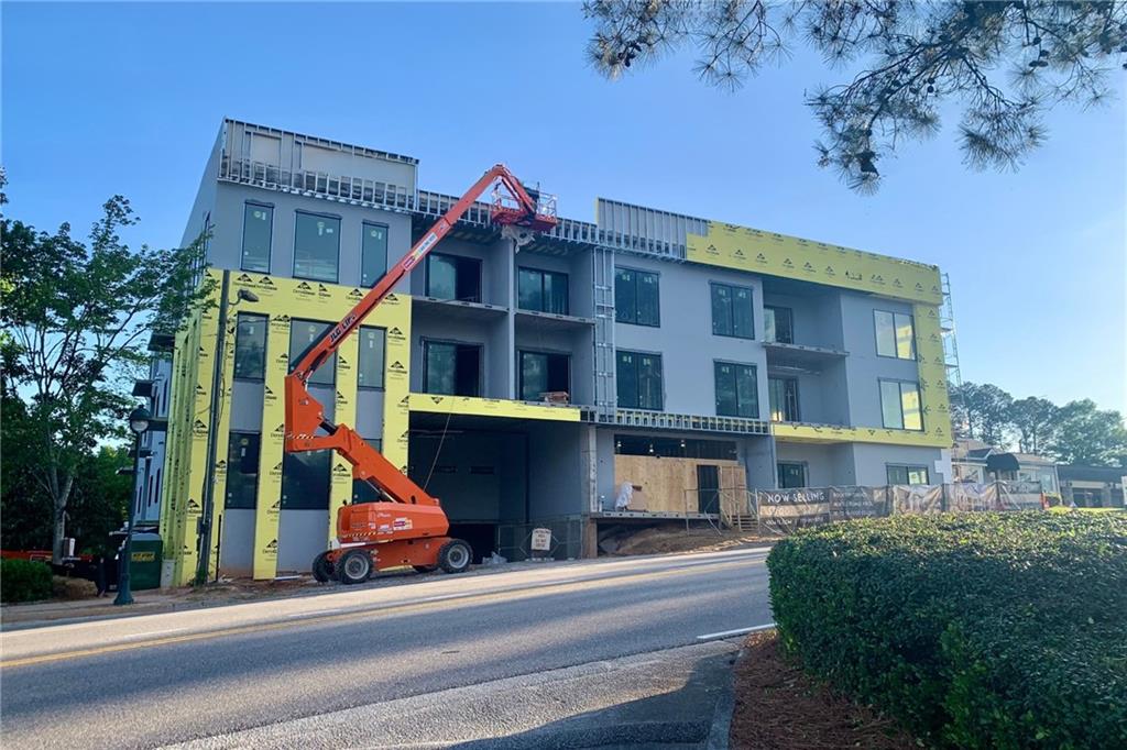 318 Sandy Springs Circle, Unit 110 Atlanta, GA 30328 - Photo 10 of 27 a view of building along with street