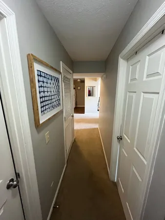 a view of entryway with a door
