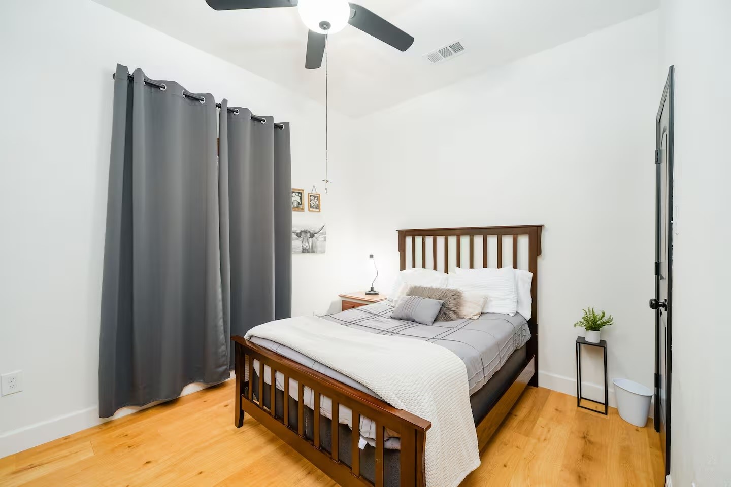 502 Dark Street Brenham, TX 77833 - Photo 11 of 23 a bedroom with a bed and a table