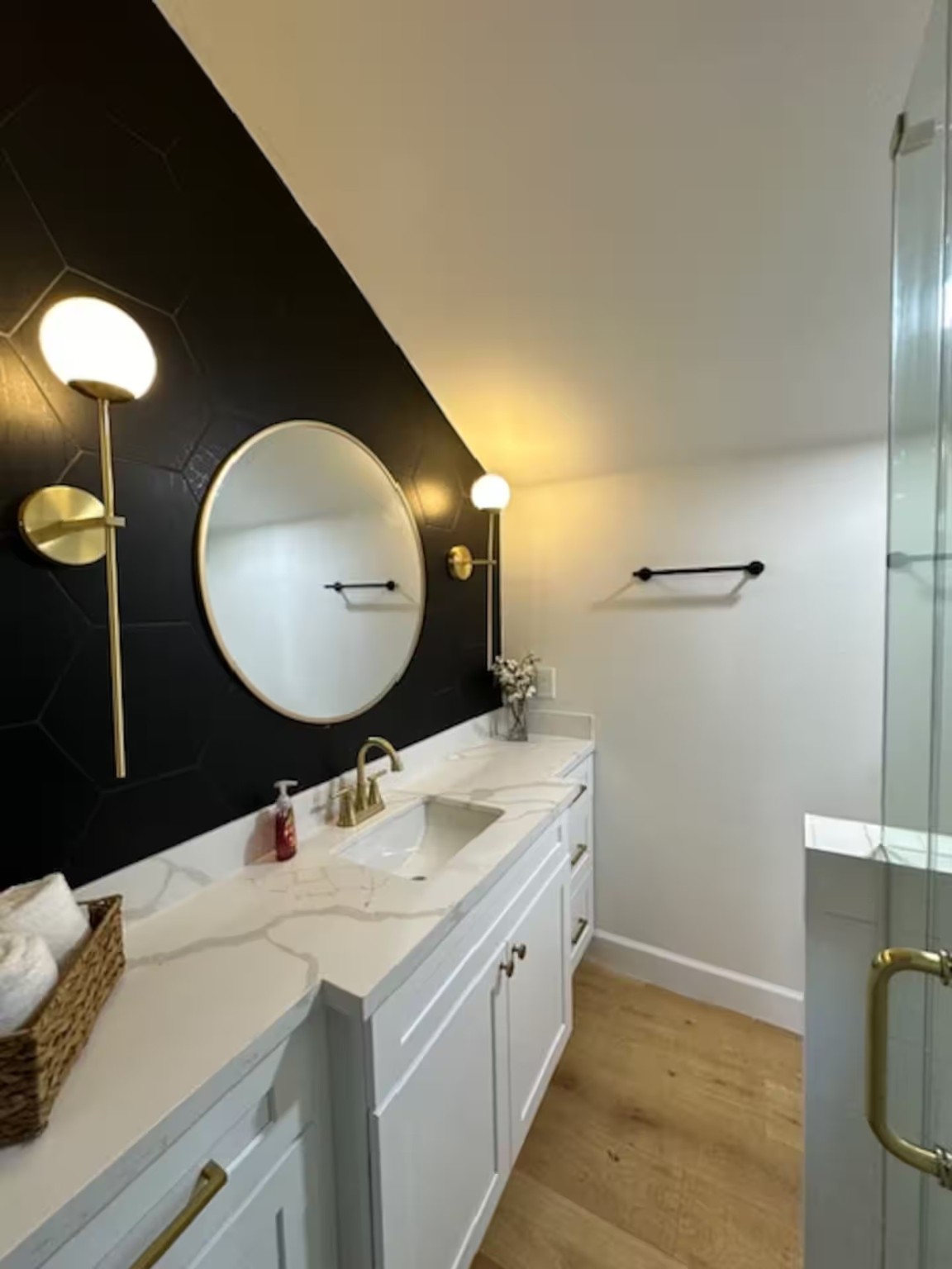 502 Dark Street Brenham, TX 77833 - Photo 14 of 23 a bathroom with a double vanity sink and a mirror