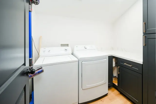 a utility room with dryer and washer
