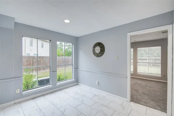 a view of a livingroom with furniture