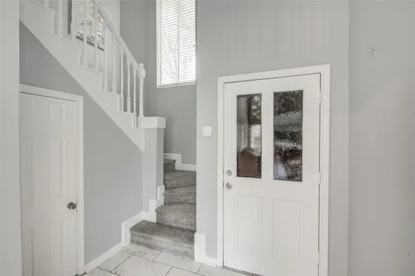 a kitchen that has a sink and a stove