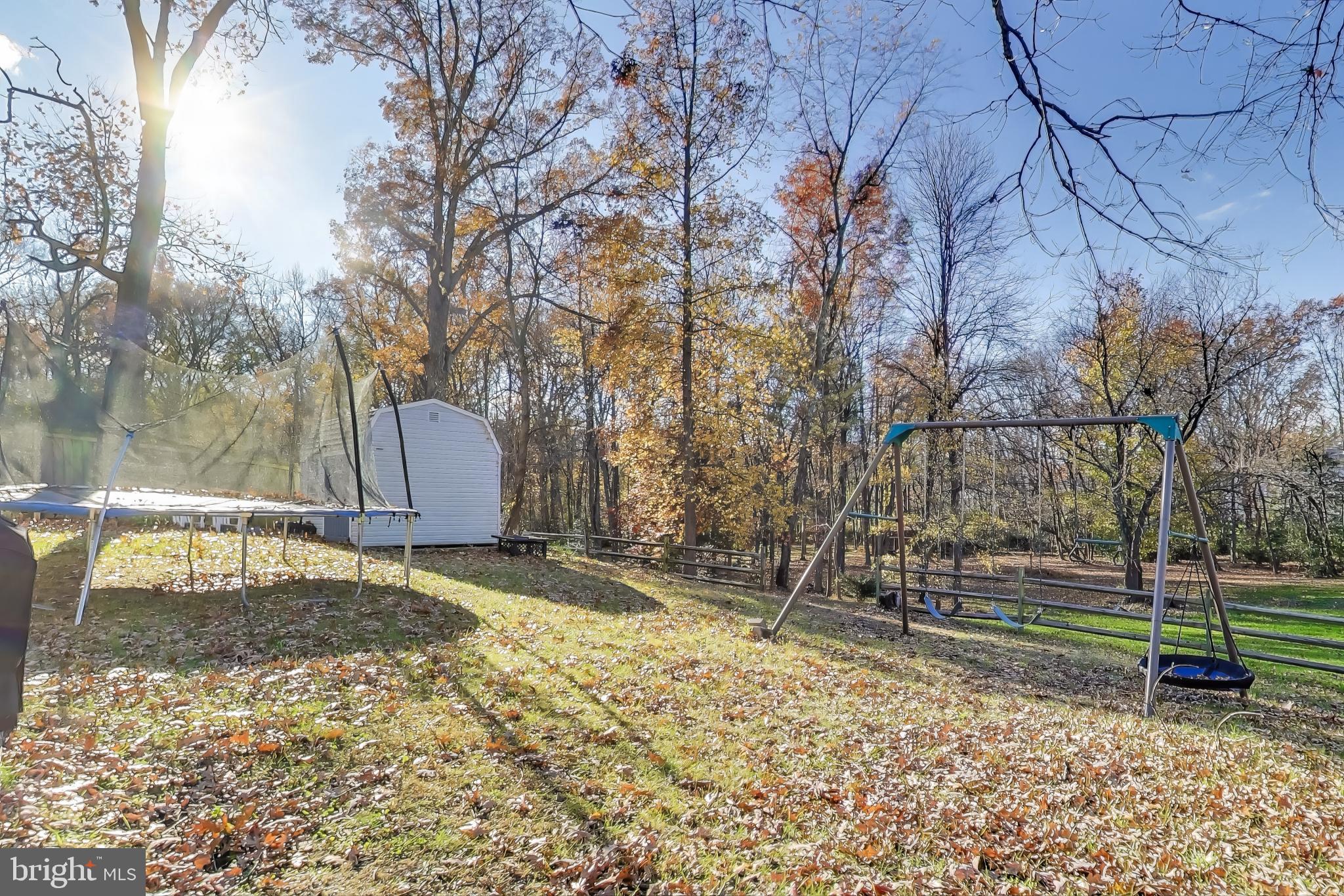 8238 WB&A Road Severn, MD 21144 - Photo 18 of 23 a backyard of a house with lots of green space
