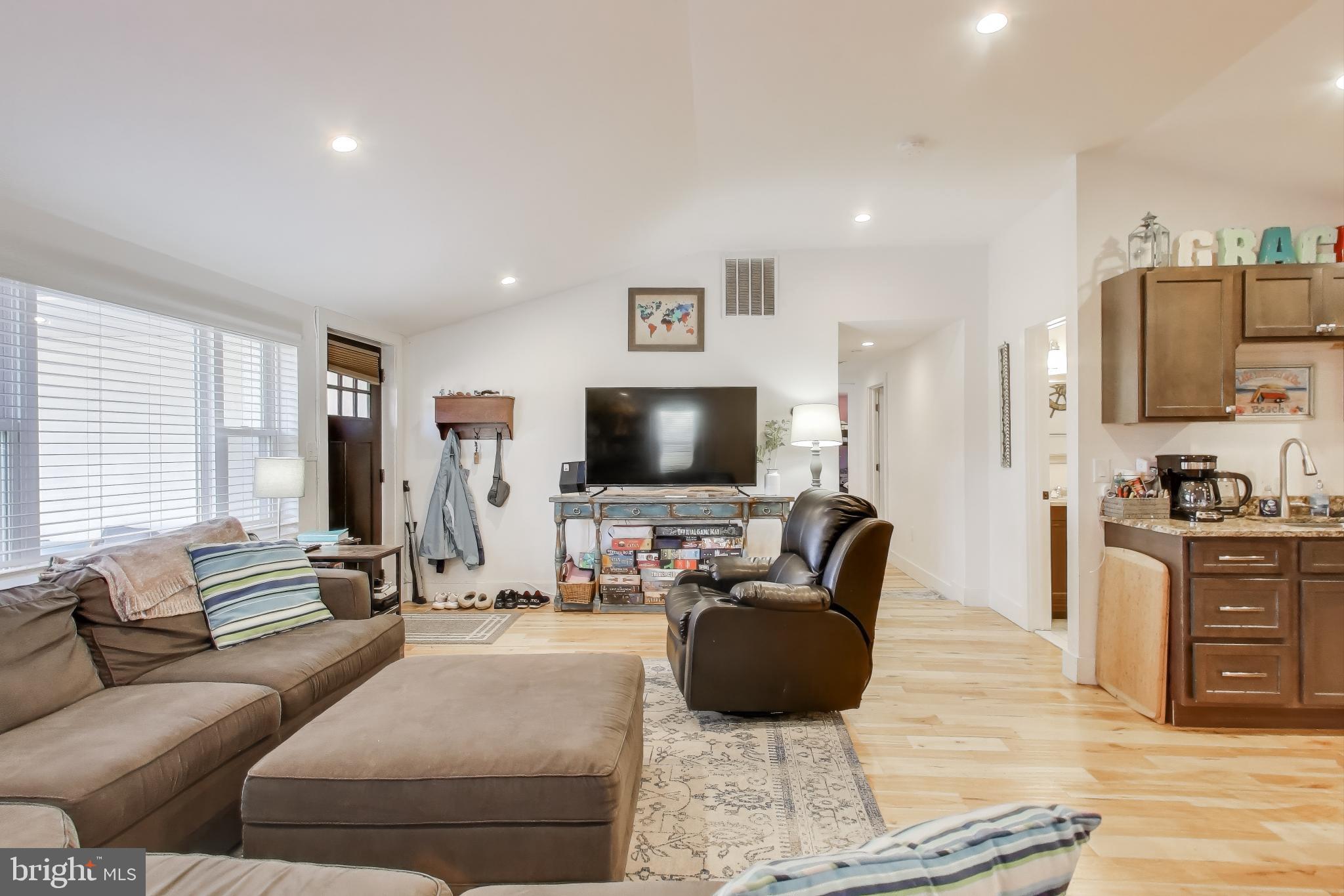 8238 WB&A Road Severn, MD 21144 - Photo 4 of 23 a living room with furniture and a flat screen tv