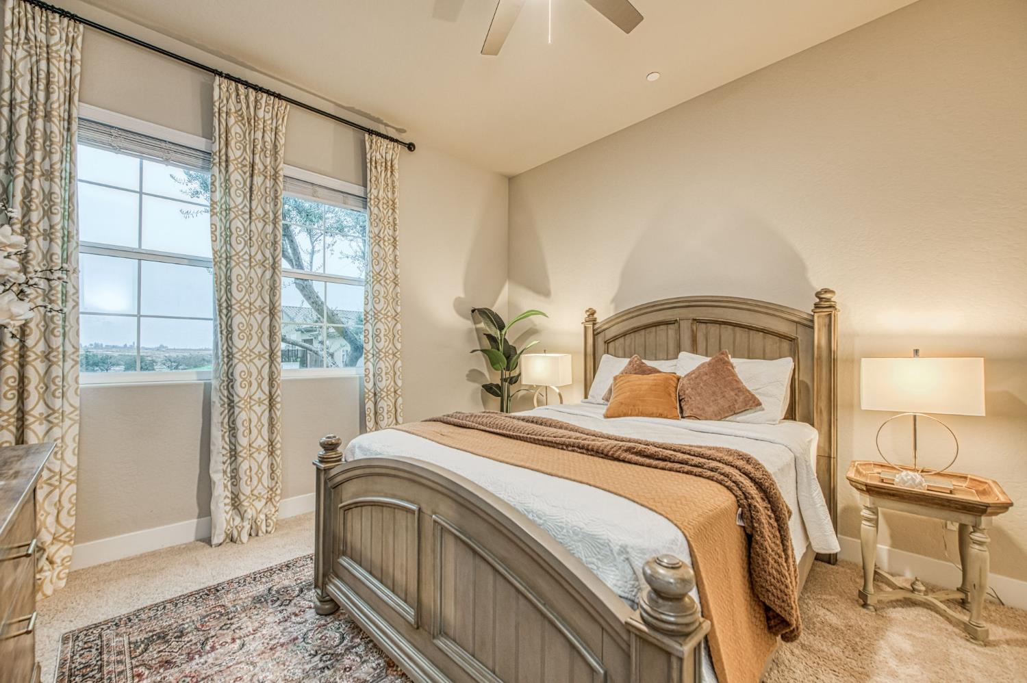 993 Ridgeline Road Madera, CA 93636 - Photo 39 of 84 a bedroom with a bed and a window