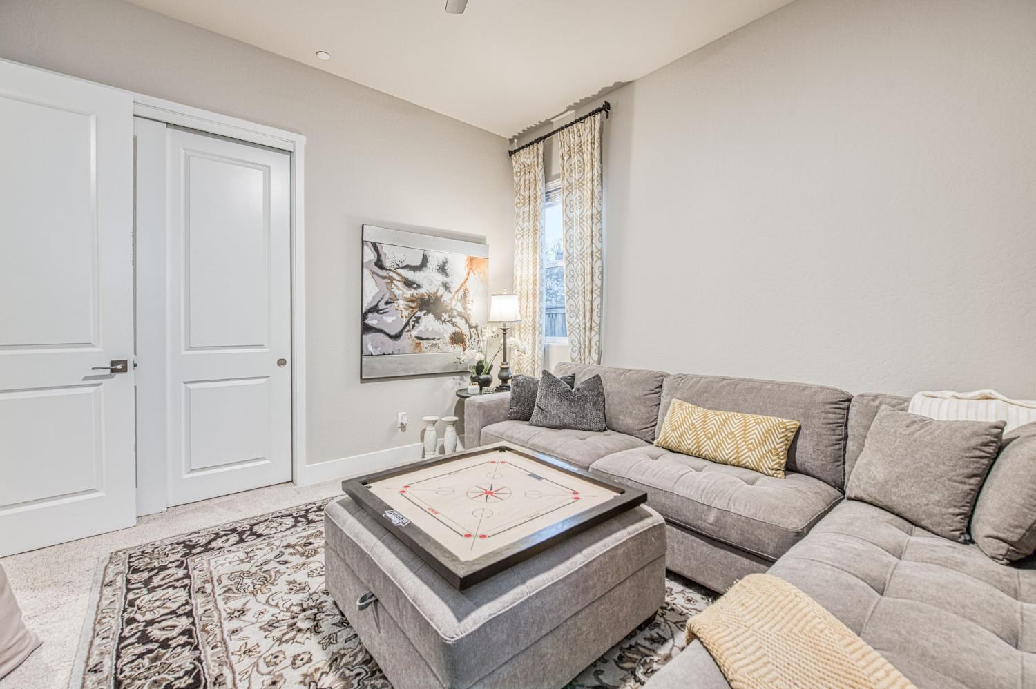 993 Ridgeline Road Madera, CA 93636 - Photo 47 of 84 a living room with furniture and a rug
