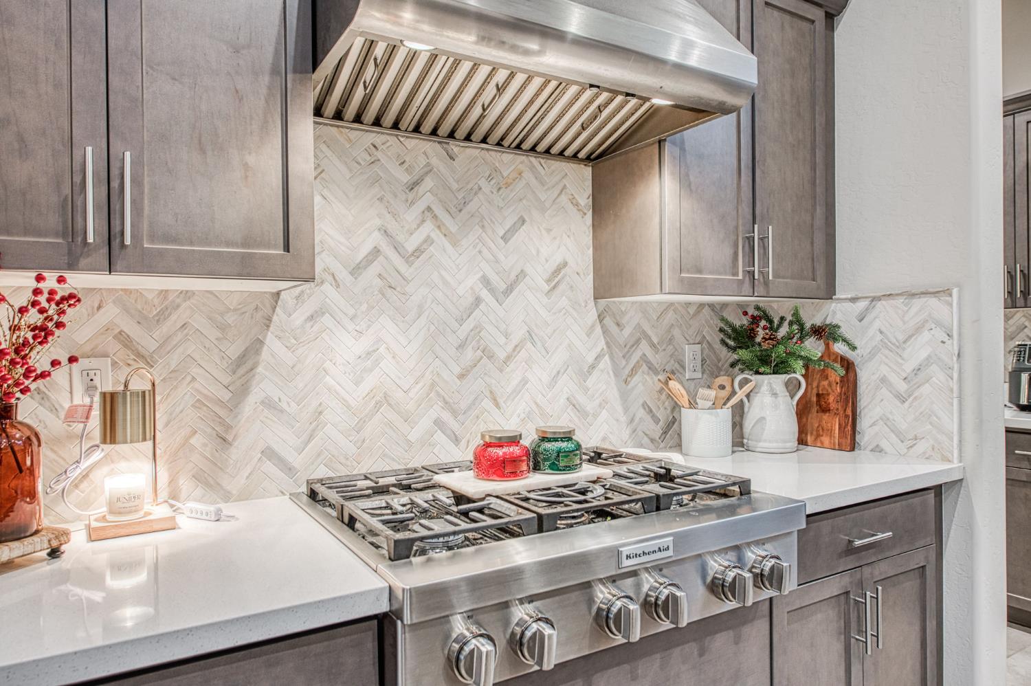 993 Ridgeline Road Madera, CA 93636 - Photo 56 of 84 a kitchen with a stove and a sink