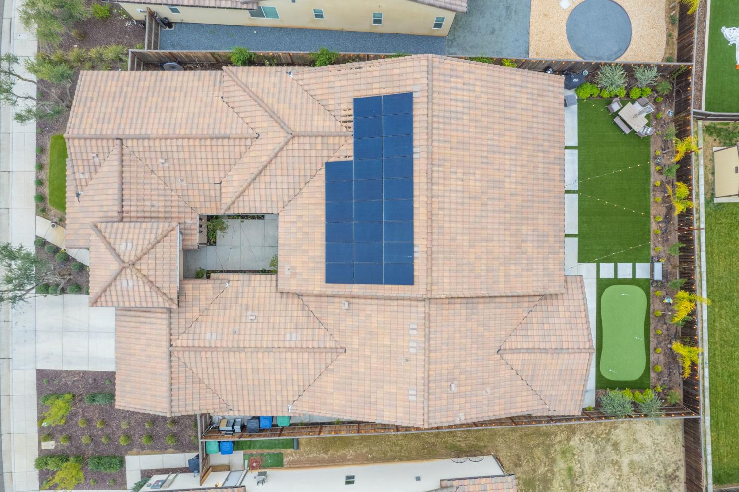 993 Ridgeline Road Madera, CA 93636 - Photo 7 of 84 a front view of a house with a garden