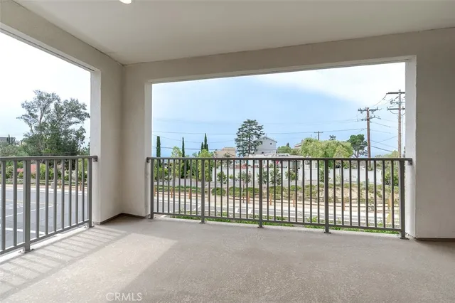 a view of a street from balcony