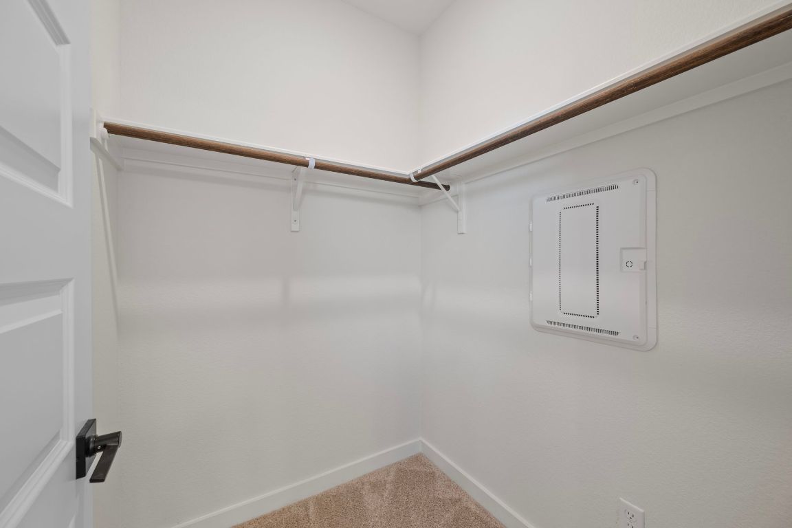 2600 Gattis School Road, Unit 1203 Round Rock, TX 78664 - Photo 16 of 25 Walk in closet featuring light colored carpet and electric panel