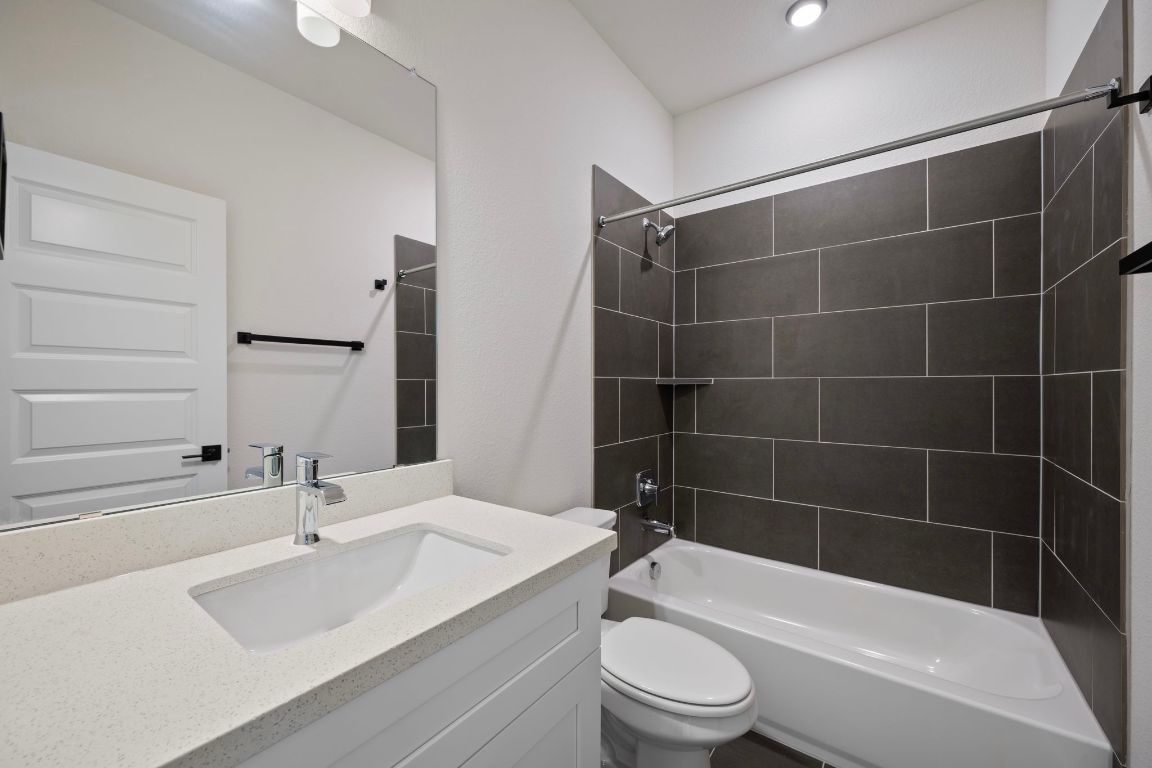 2600 Gattis School Road, Unit 1203 Round Rock, TX 78664 - Photo 19 of 25 Bathroom with bathing tub / shower combination and vanity
