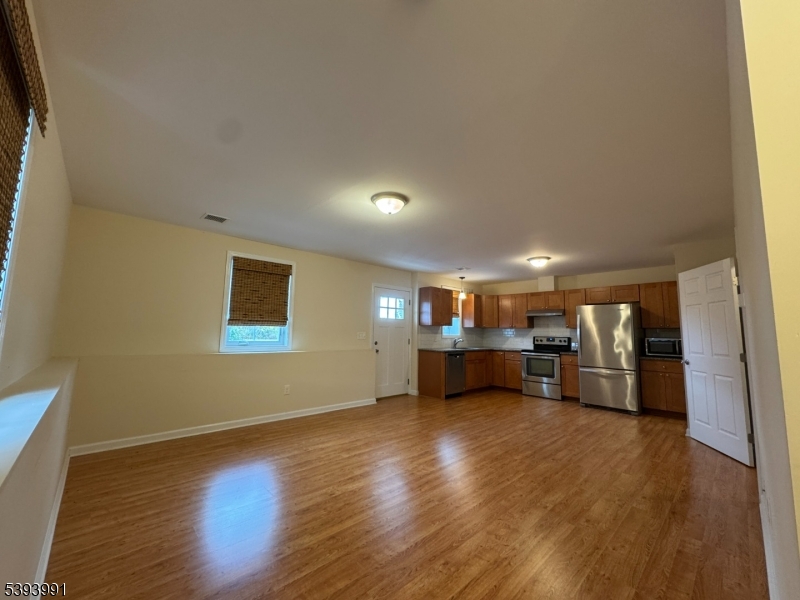 85 Highway 206, Unit B Augusta, NJ 07822 - Photo 13 of 42 a view of a livingroom with furniture and a wooden floor