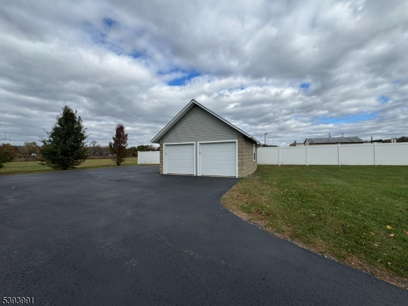 85 Highway 206, Unit B Augusta, NJ 07822 - Photo 30 of 42 a view of a house with a big yard and large tree