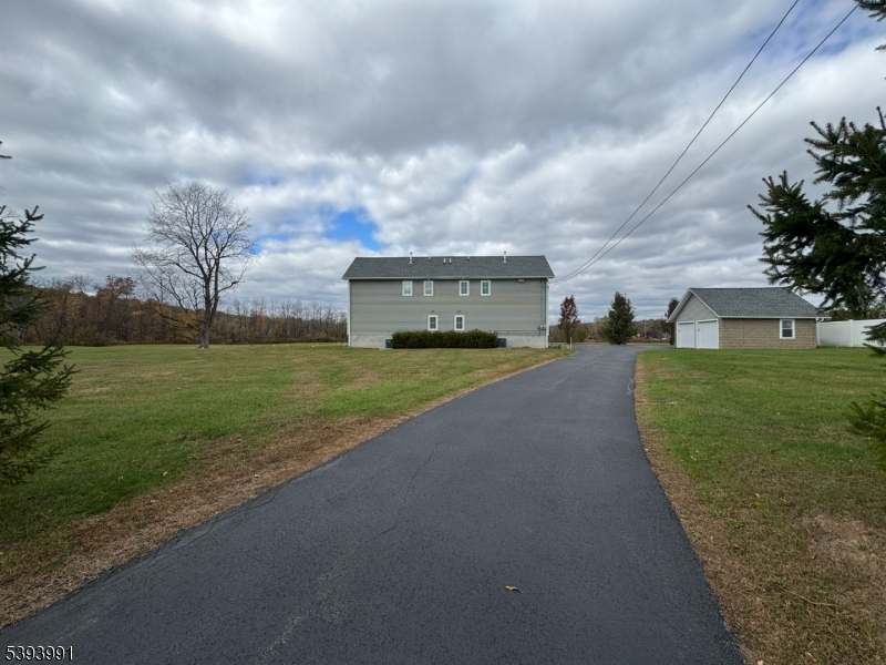 85 Highway 206, Unit B Augusta, NJ 07822 - Photo 31 of 42 a view of a house with a big yard and potted plants