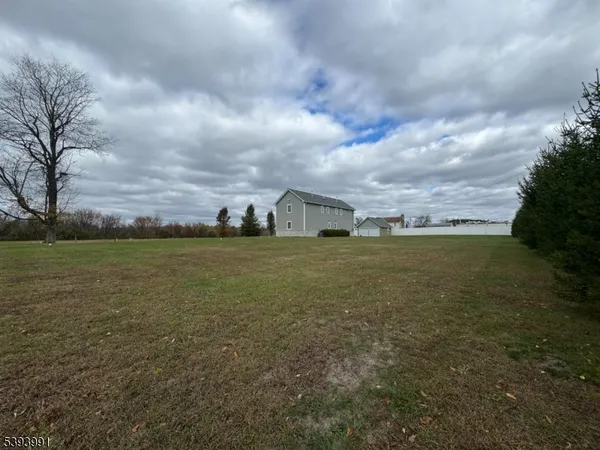 a view of a field with sitting space