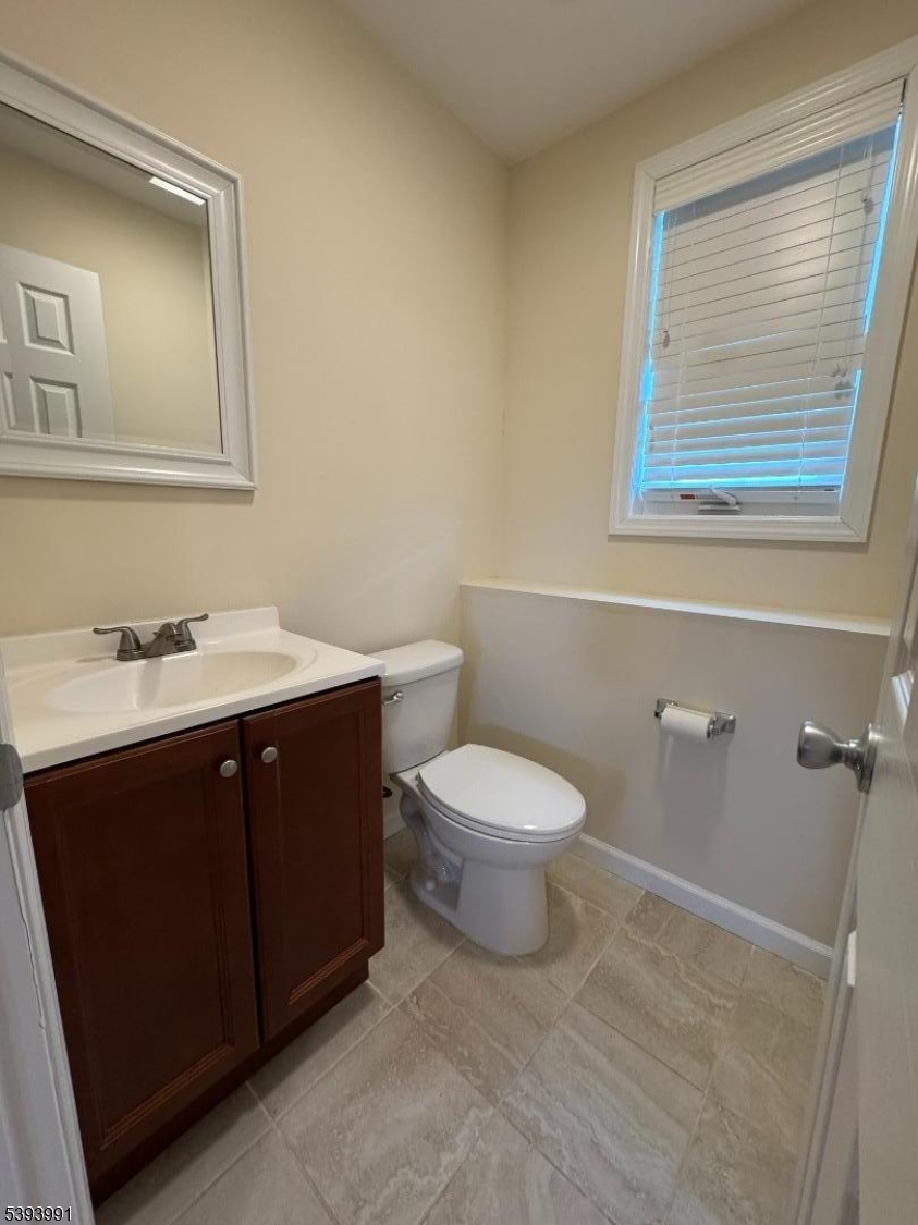 85 Highway 206, Unit B Augusta, NJ 07822 - Photo 7 of 42 a bathroom with a toilet sink and mirror