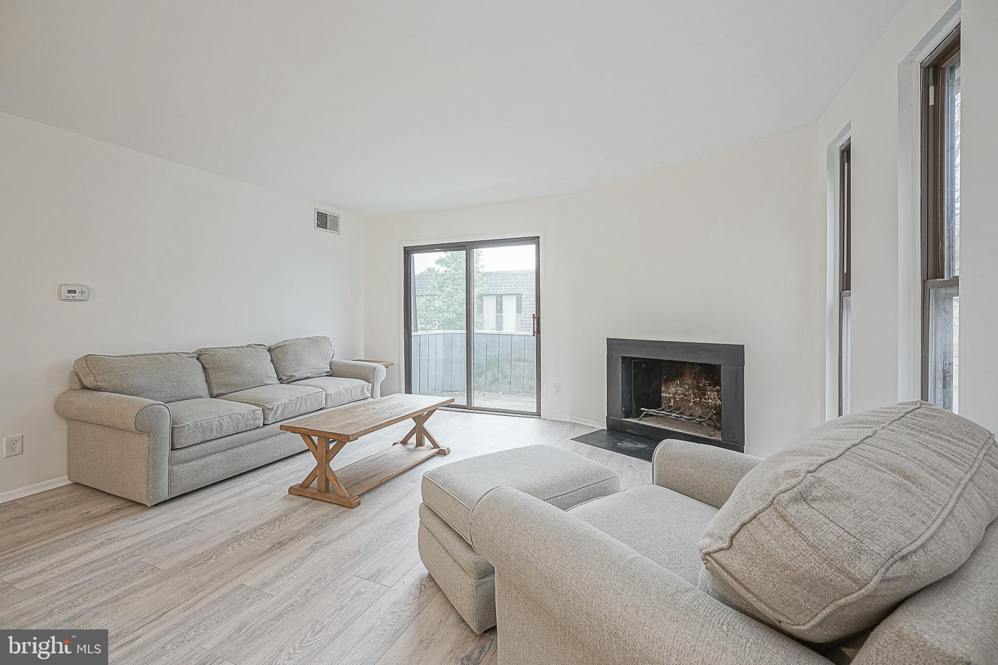 25 South Church Road, Unit 58 Maple Shade, NJ 08052 - Photo 3 of 18 Open and Bright Family Room with Fireplace
