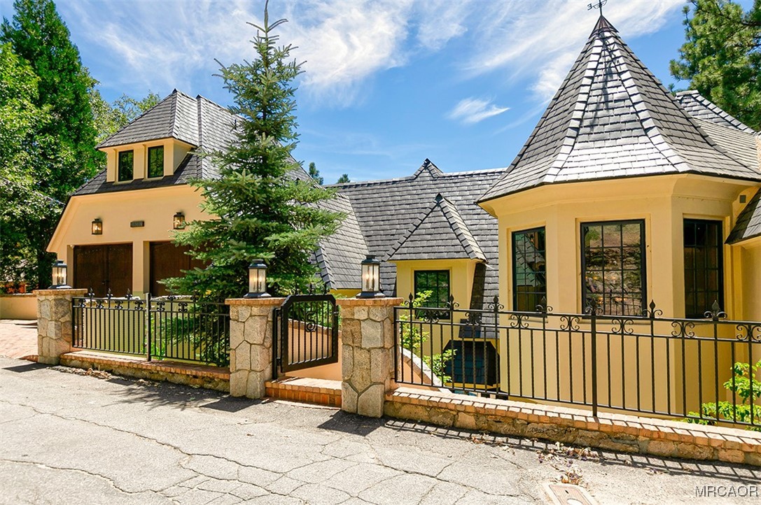 a front view of a house with a porch