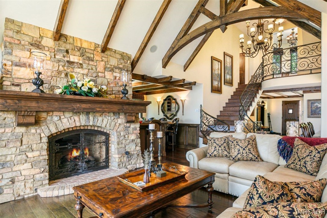 28087 North Shore Road Lake Arrowhead, CA 92352 - Photo 12 of 48 a living room with furniture and a fireplace