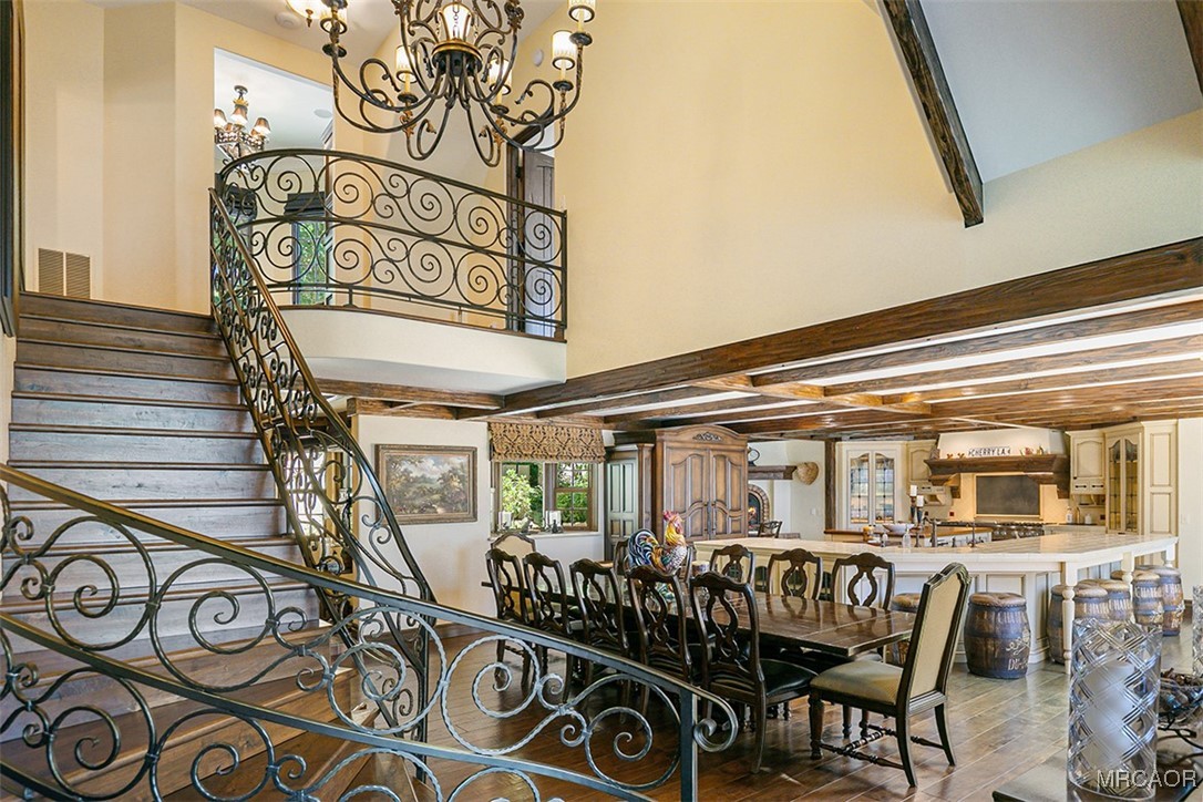28087 North Shore Road Lake Arrowhead, CA 92352 - Photo 22 of 48 a view of a chairs and table in a patio