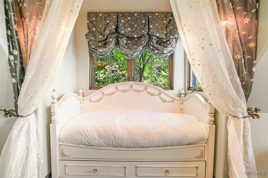 28087 North Shore Road Lake Arrowhead, CA 92352 - Photo 26 of 48 a white bath tub sitting in a bathroom next to a window