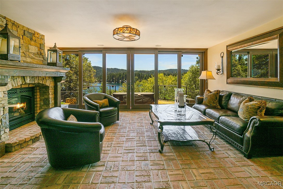 28087 North Shore Road Lake Arrowhead, CA 92352 - Photo 27 of 48 a living room with furniture and a large window