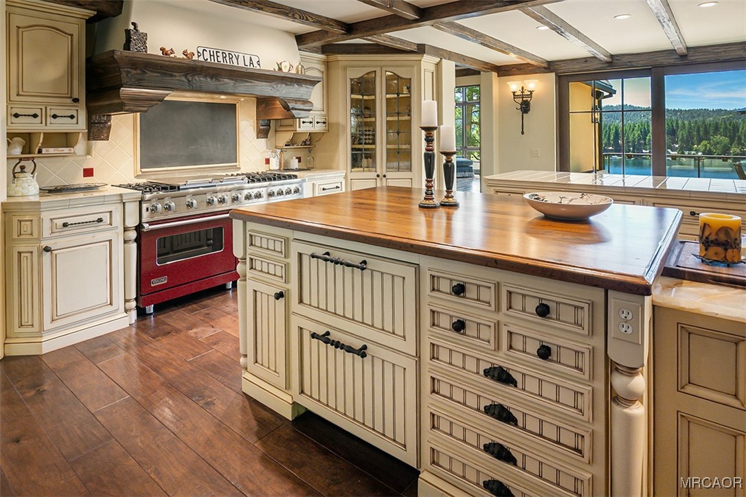 28087 North Shore Road Lake Arrowhead, CA 92352 - Photo 7 of 48 a kitchen with stainless steel appliances granite countertop a stove and a sink