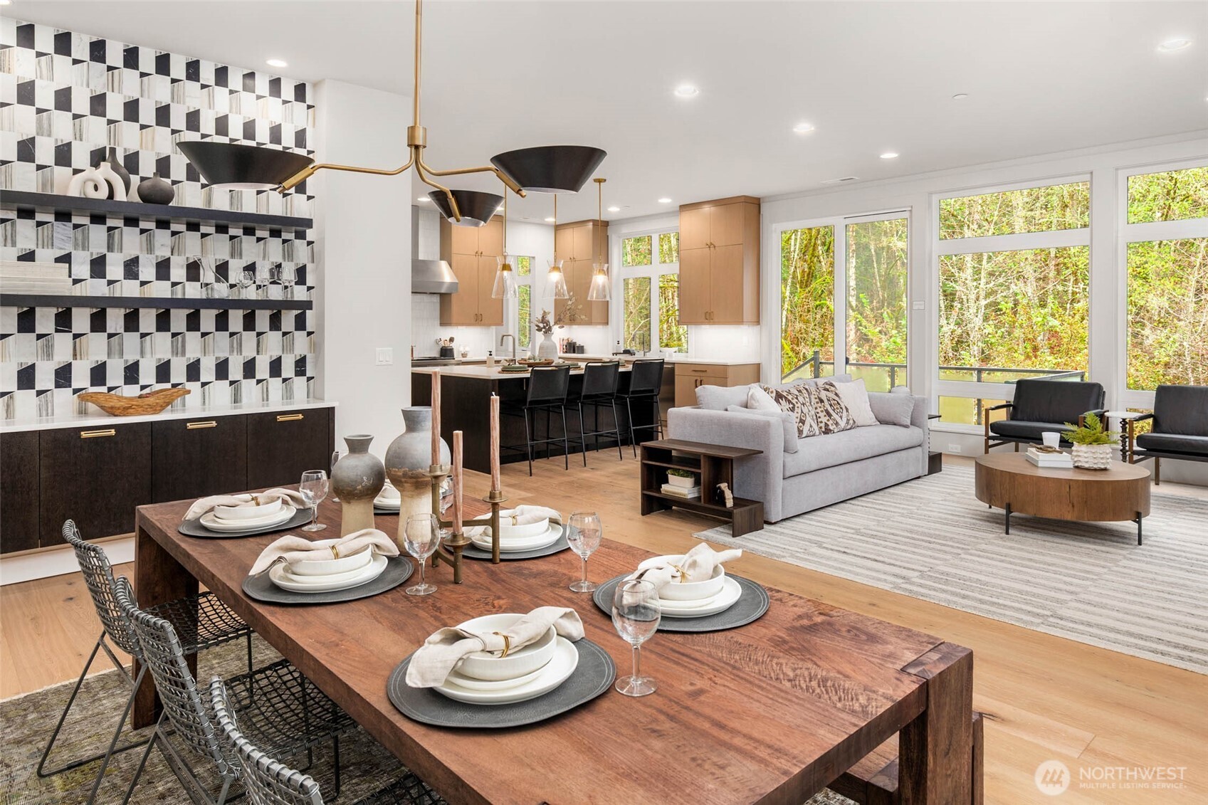 21041 Southeast 80th Street Issaquah, WA 98027 - Photo 12 of 35 a living room with furniture kitchen view and a large window