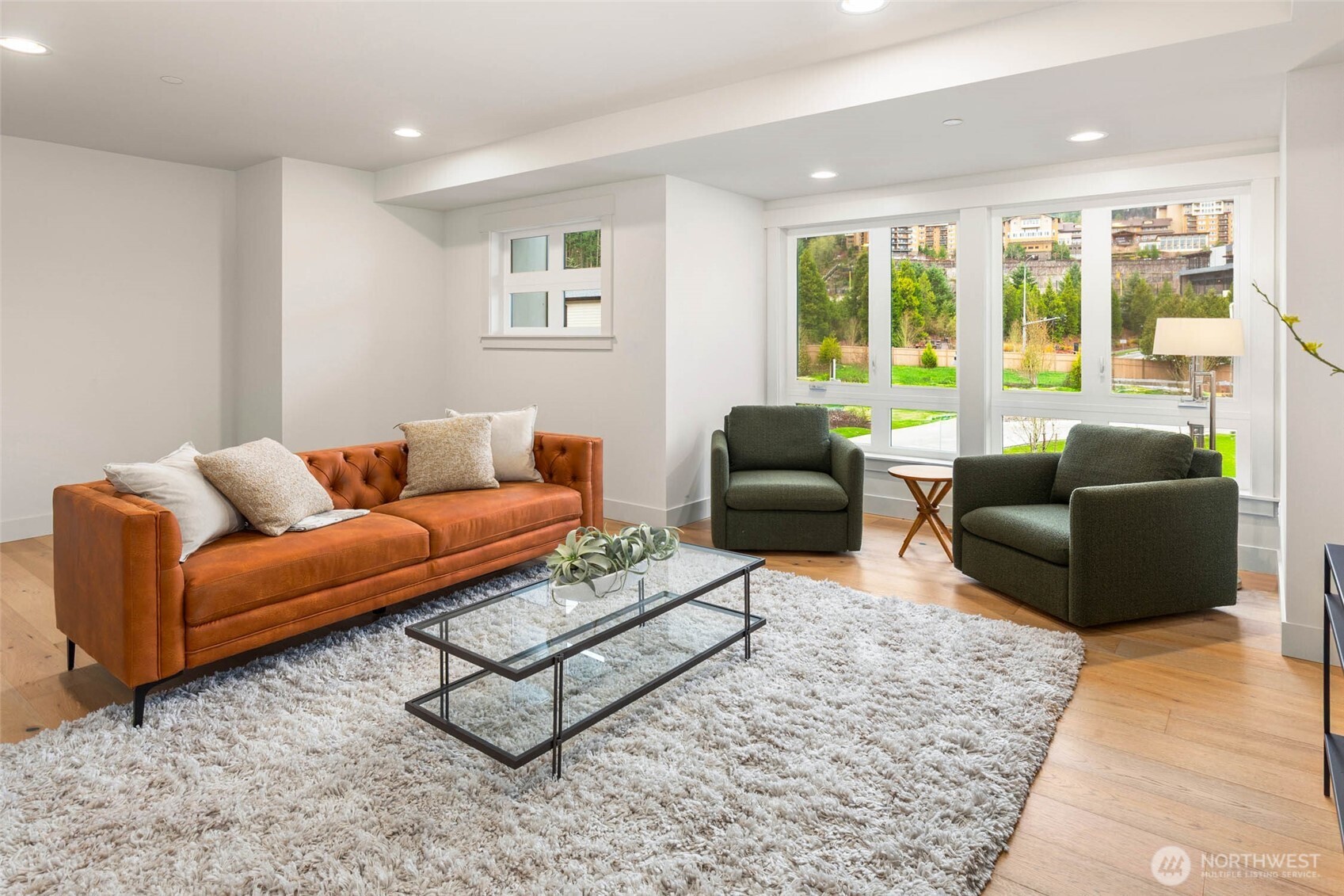 21041 Southeast 80th Street Issaquah, WA 98027 - Photo 23 of 35 a living room with furniture and a large window