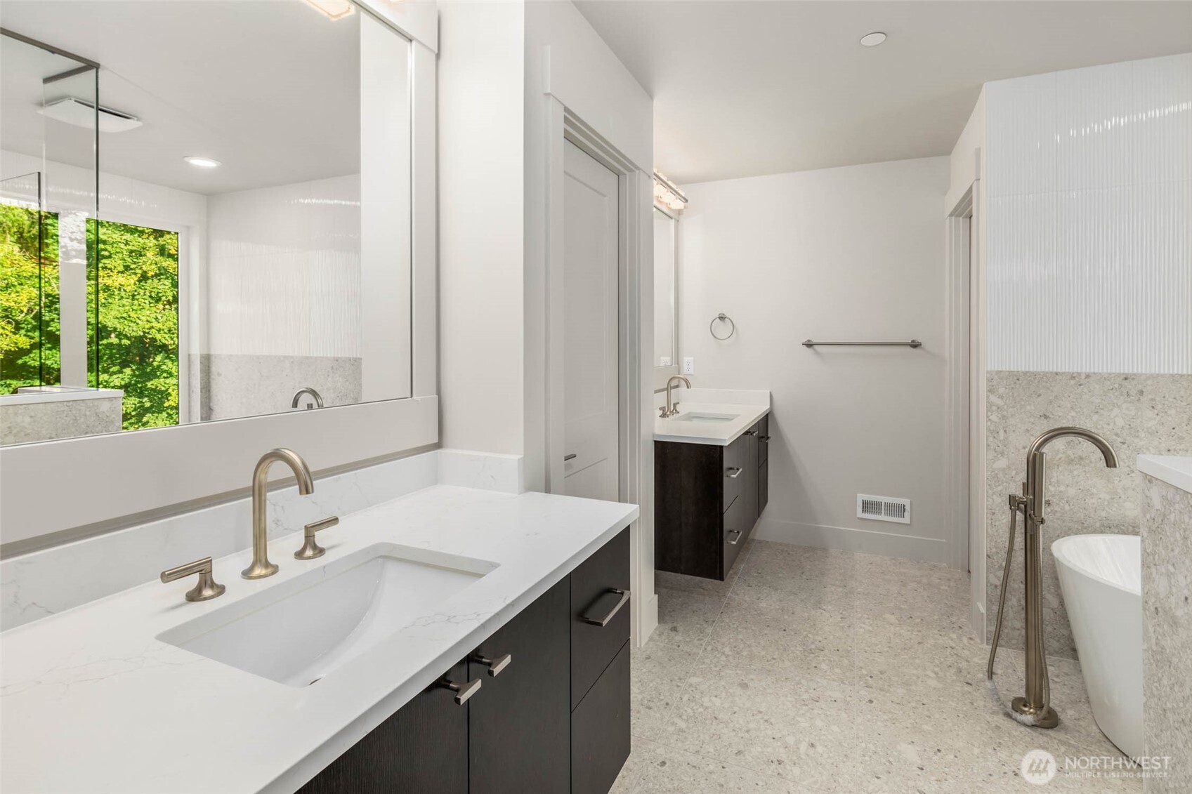 21041 Southeast 80th Street Issaquah, WA 98027 - Photo 29 of 35 a bathroom with a double vanity sink mirror and bathtub