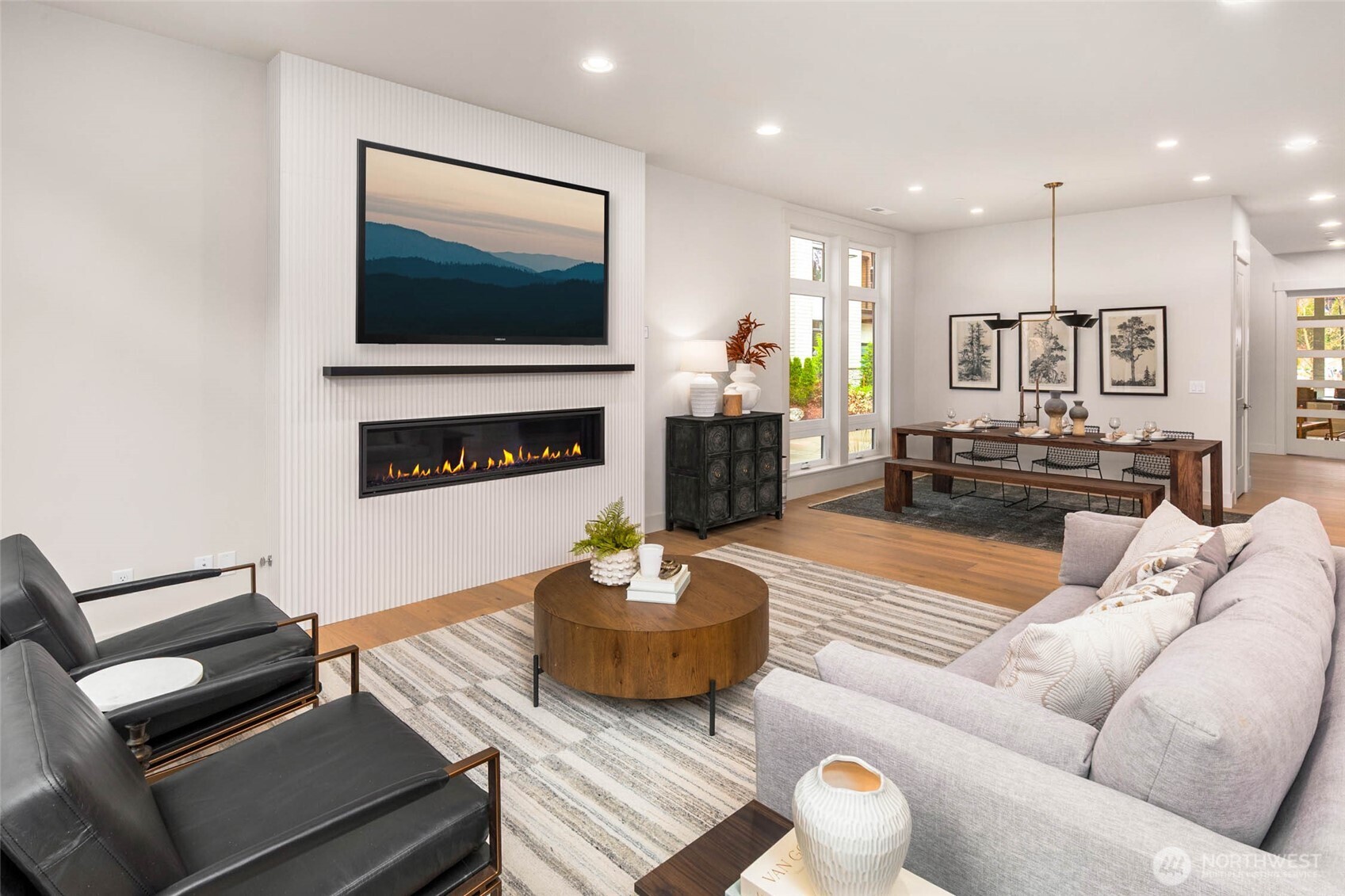 21041 Southeast 80th Street Issaquah, WA 98027 - Photo 10 of 35 a living room with furniture and a flat screen tv