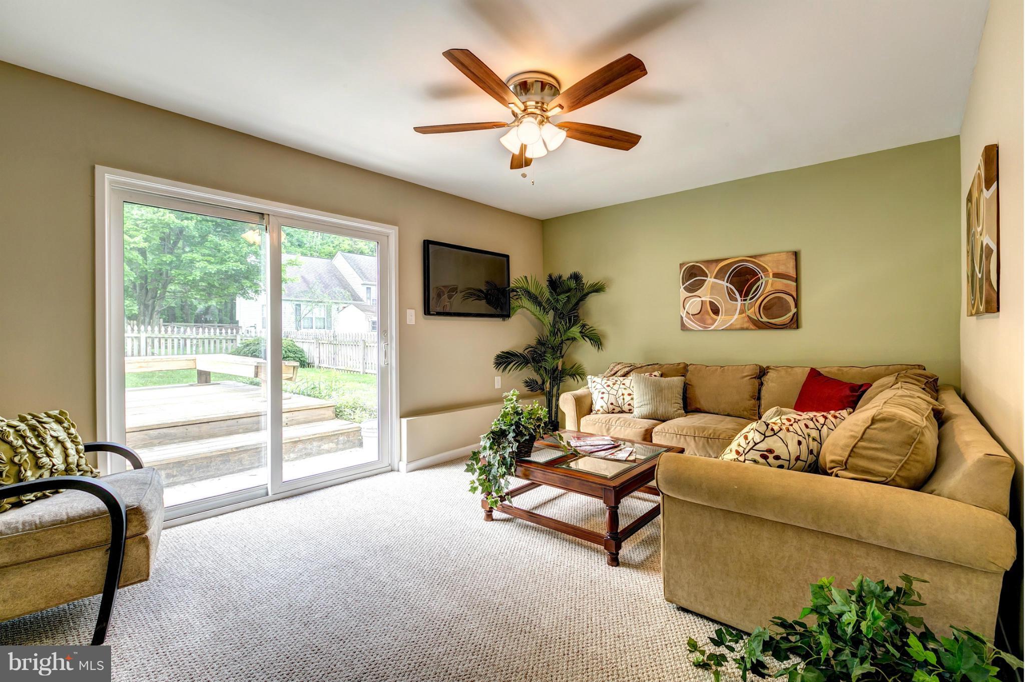 12813 Cunninghill Cove Road Baltimore, MD 21220 - Photo 13 of 30 Family Room with Sliders To Rear Deck