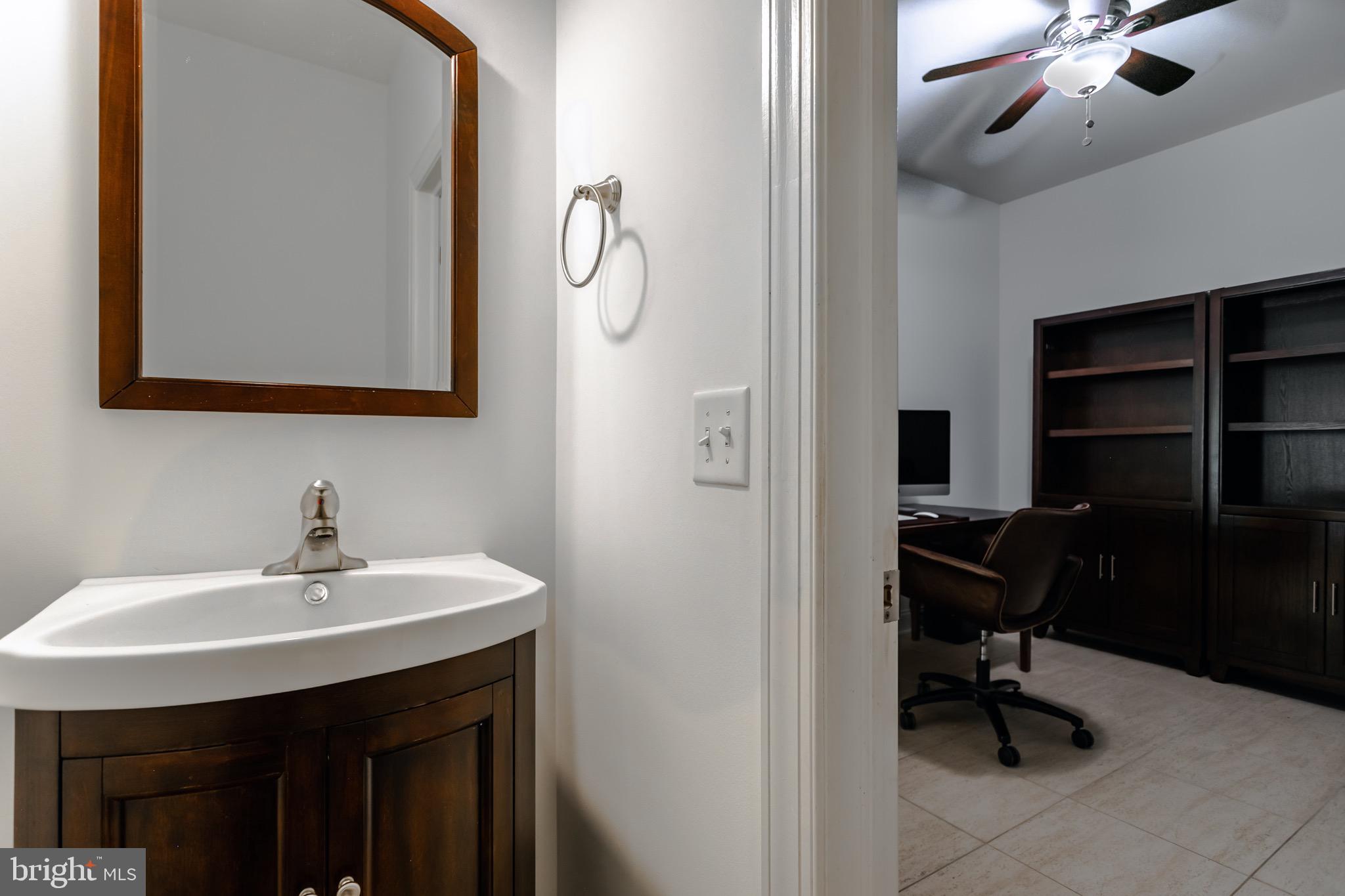 41 Penn Road Voorhees, NJ 08043 - Photo 42 of 49 Powder room by garage entrance/ office.