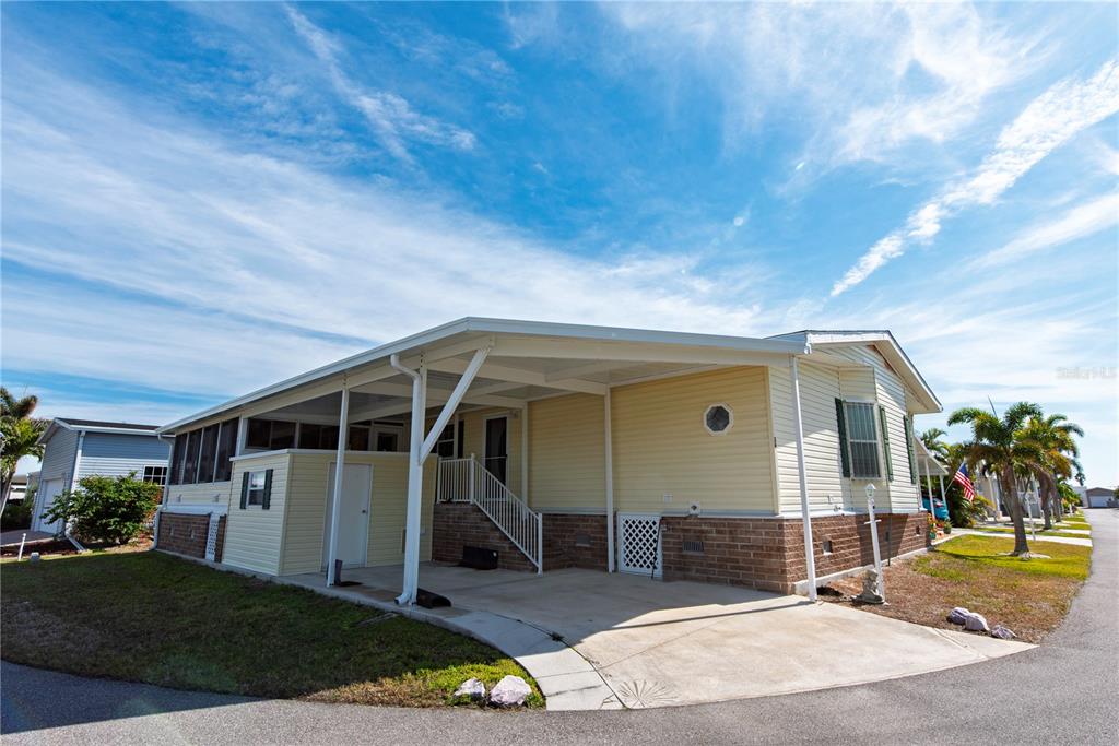 36 Emden Circle Punta Gorda, FL 33950 - Photo 1 of 1 a view of a house with backyard porch and seating area