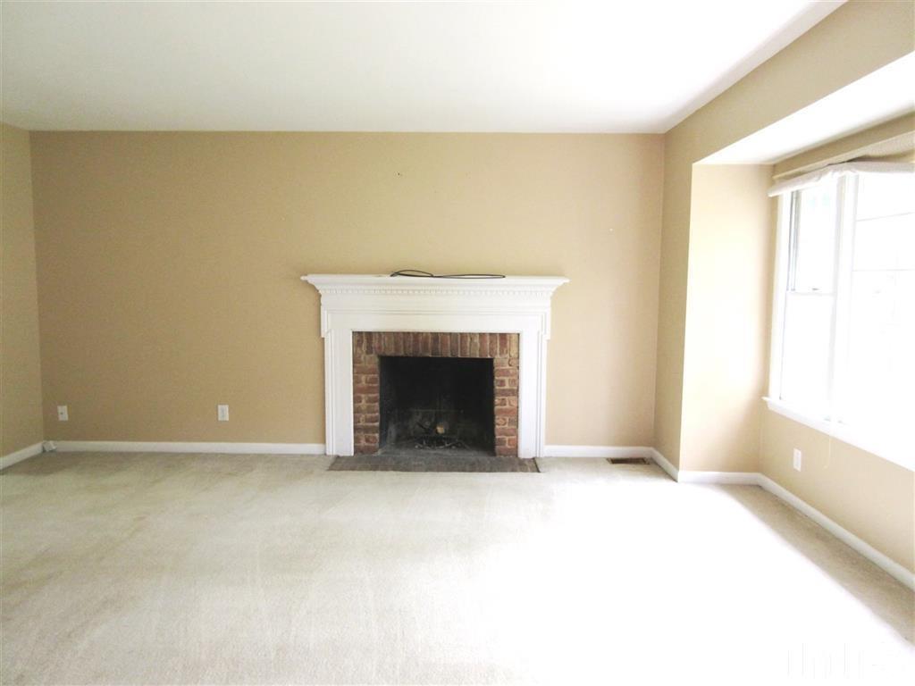 2729 Rothgeb Drive Raleigh, NC 27609 - Photo 3 of 14 a view of an empty room with a window