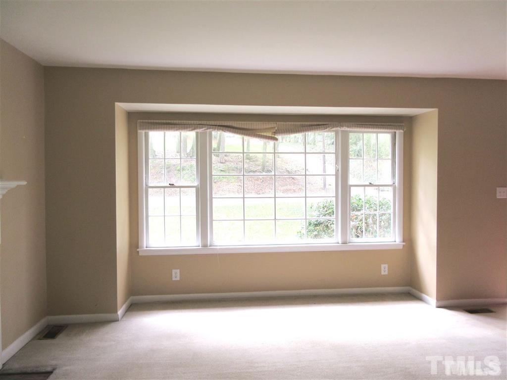 2729 Rothgeb Drive Raleigh, NC 27609 - Photo 4 of 14 a view of an empty room with a window