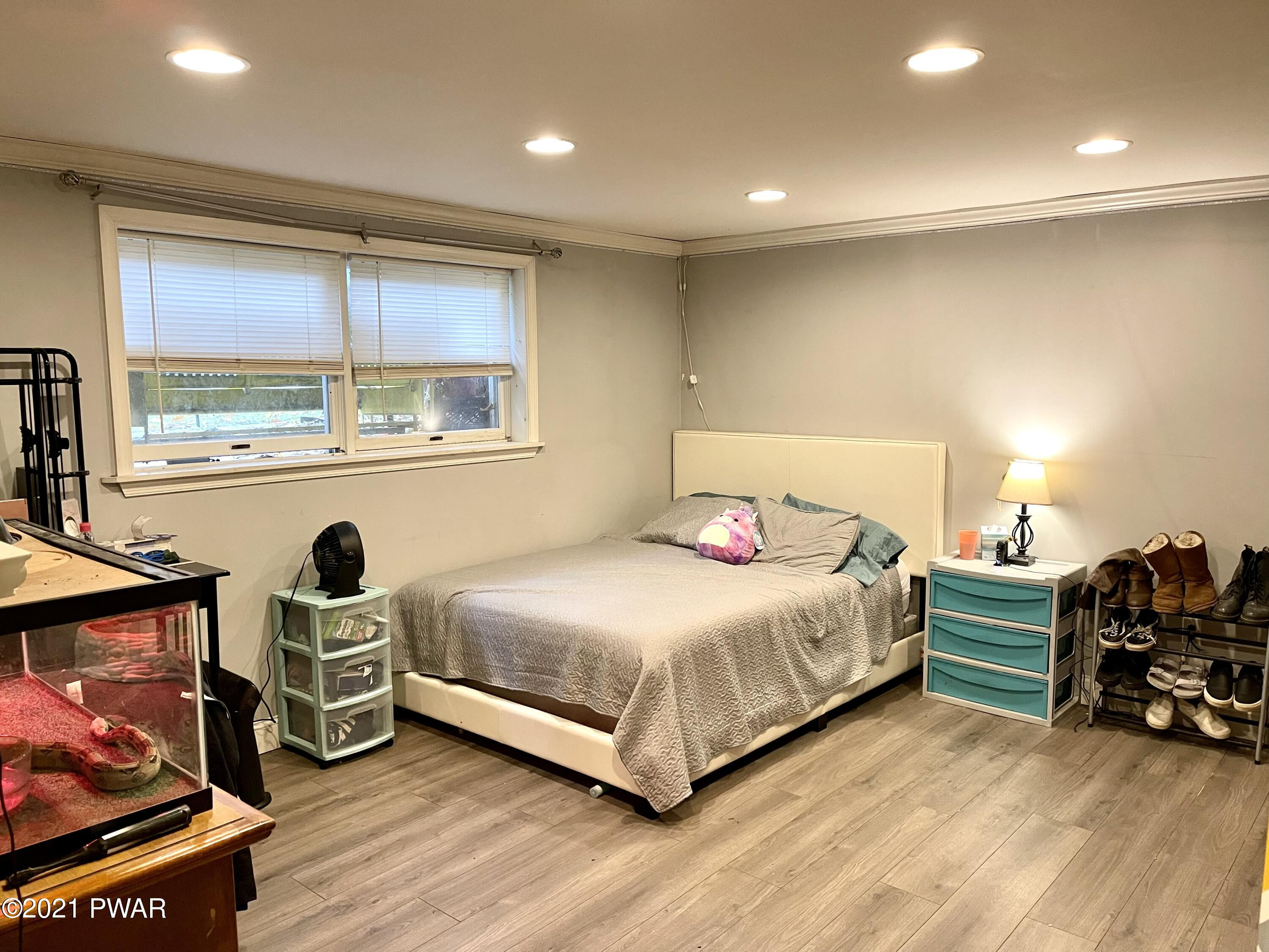 127 Estates Road Greentown, PA 18426 - Photo 67 of 85 a bedroom with a bed and a large window